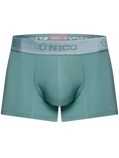 Teal ceramic trunks with a silver glittery waistband featuring unico brand logo color 43 green