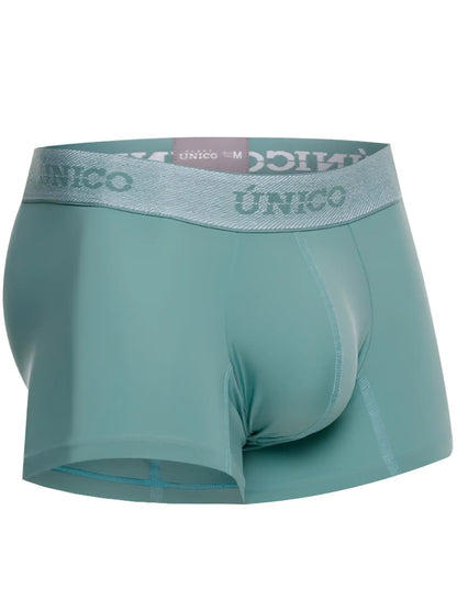 Teal men’s ceramic trunks with a silver waistband featuring the único brand name in green color 43