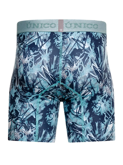 Unico men’s boxer briefs in a vibrant teal, navy blue, and white graffiti print with a matching waistband.