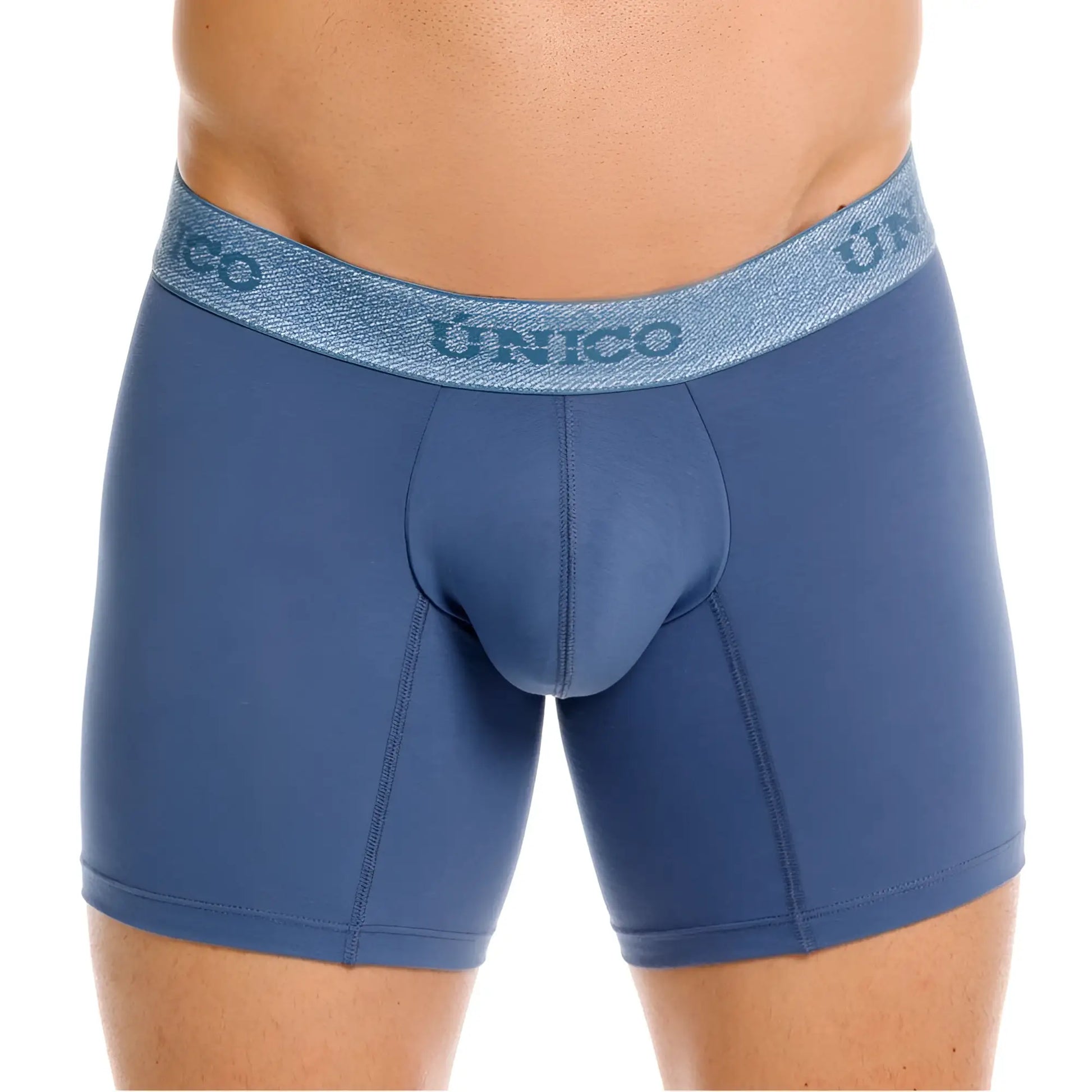 Blue unico classic boxer briefs in teal with a textured waistband featuring the brand name in dark blue lettering