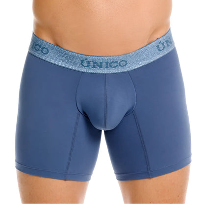Blue unico classic boxer briefs in teal with a textured waistband featuring the brand name in dark blue lettering