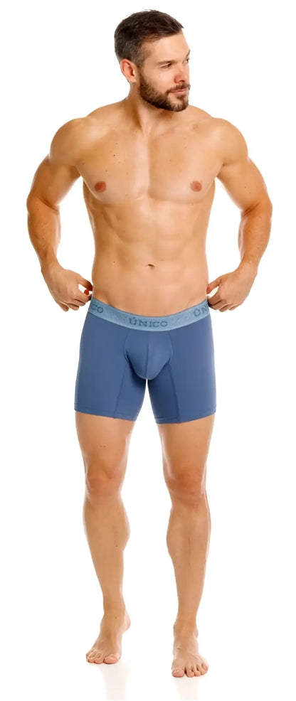 Blue unico boxer briefs with a light blue waistband featuring the brand name for premium comfort and style