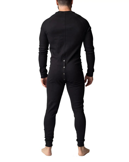 Black long-sleeved one-piece thermal union suit shown from the back with a button-down closure for warmth