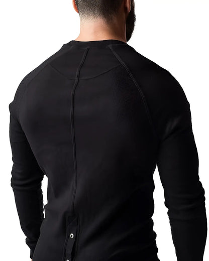 Black ribbed long-sleeve thermal union suit with crew neck and back button detail showing the back side