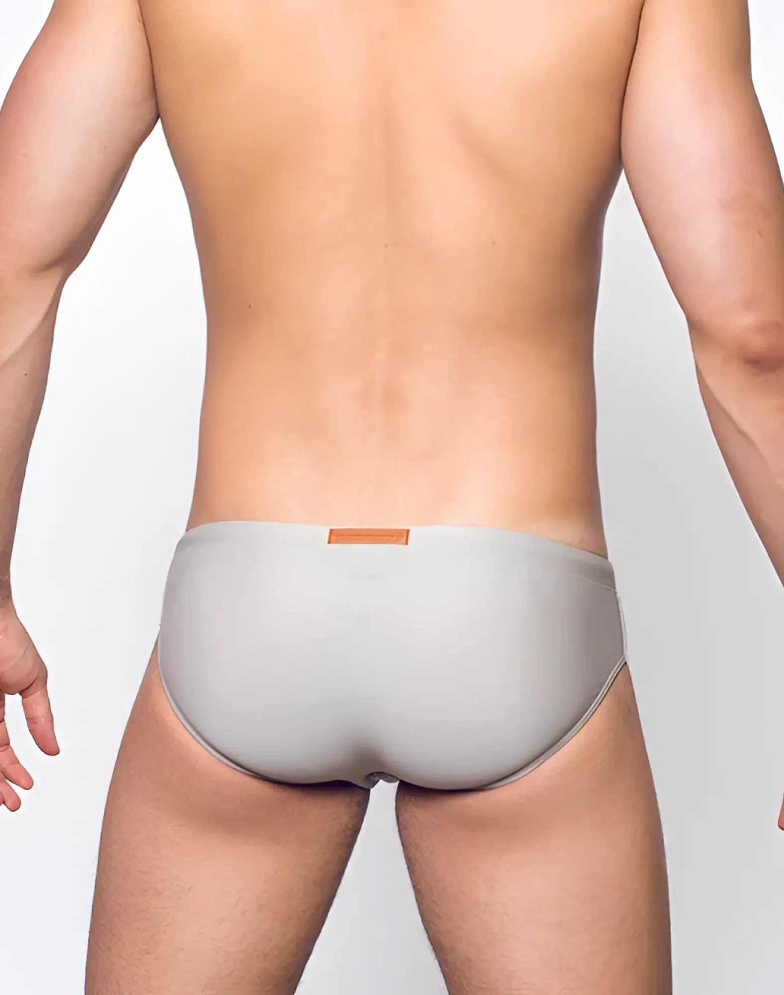 Gray V10 core bikini briefs with a small orange label on the waistband for comfortable everyday wear