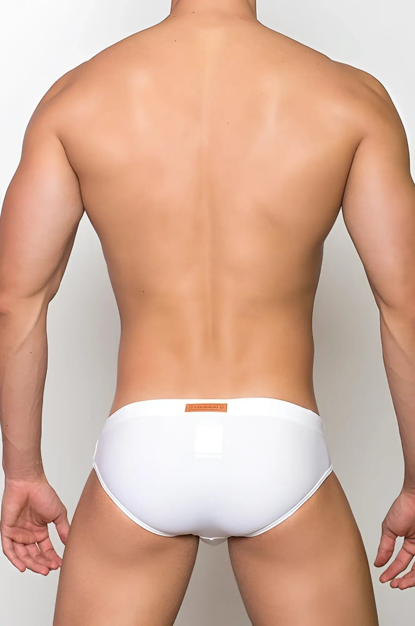 White v10 core bikini briefs with a small orange label on the waistband in soft breathable fabric