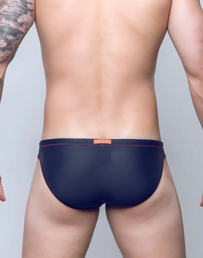 Navy blue V22 rapid swim briefs with red stitching and an orange brand tag at the waistband for quick drying