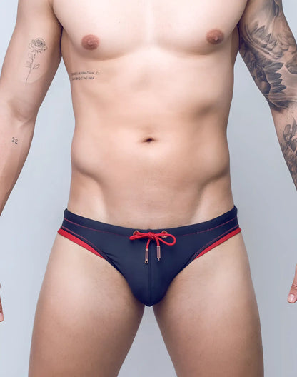 V22 rapid swim brief navy blue swim trunks with red trim and matching red drawstring tie at the front