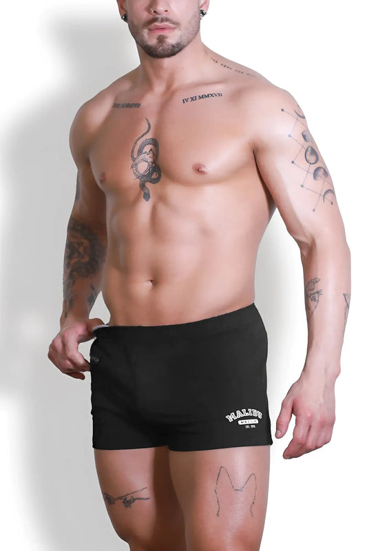 Black varsity 2 inch short shorts with zipper pocket and white embroidered logo on left leg in midnight black