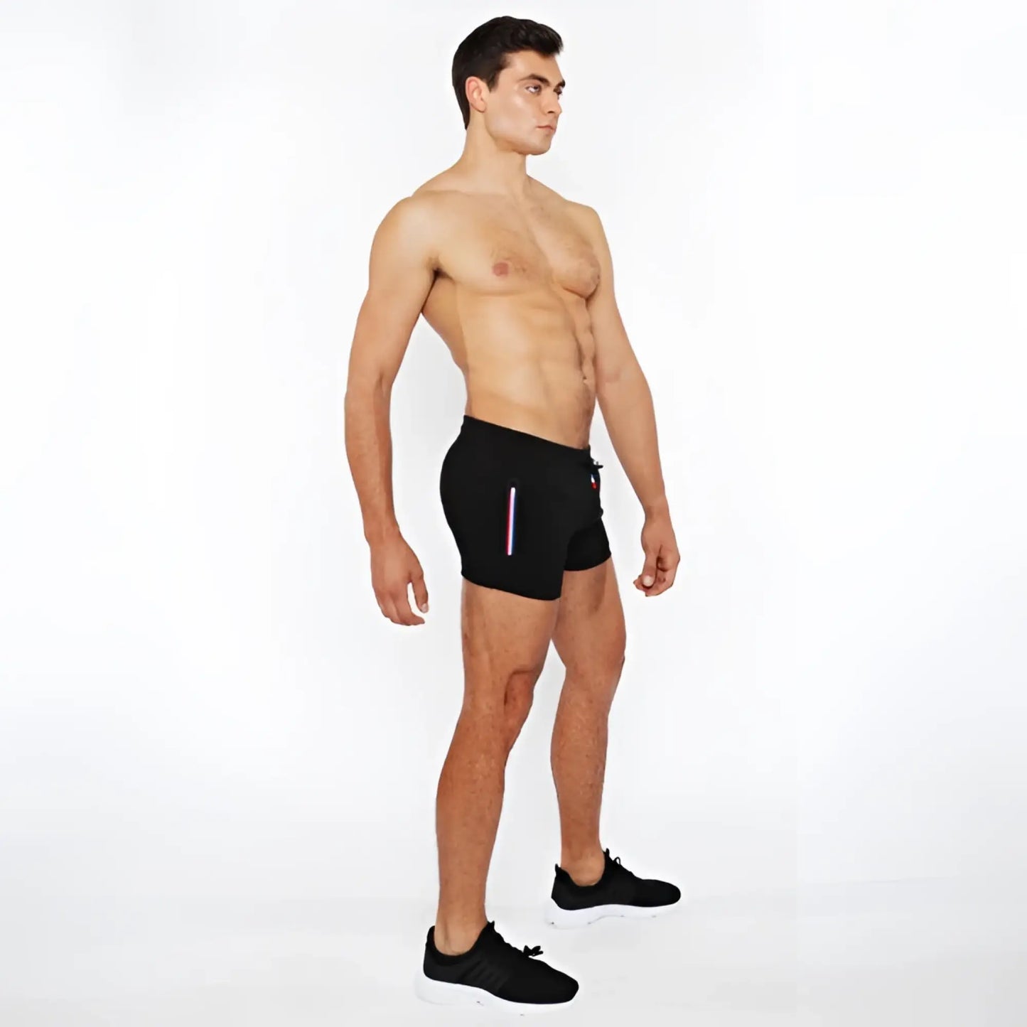 Black vault gym-tech shorts with vertical stripe detail and three color heat weld zippers for athletic use