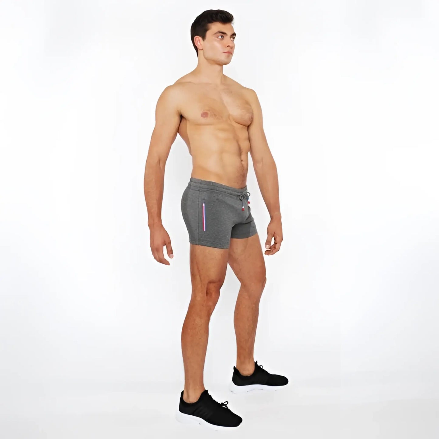 Gray vault gym-tech shorts with drawstring waist and subtle vertical stripe detailing featuring 3 color heat weld zippers