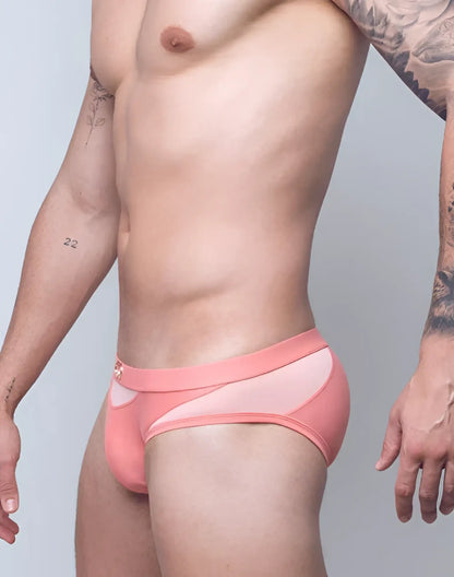 Pink vb13 swim brief with sheer mesh panel and small gold logo on waistband designed for athletic use