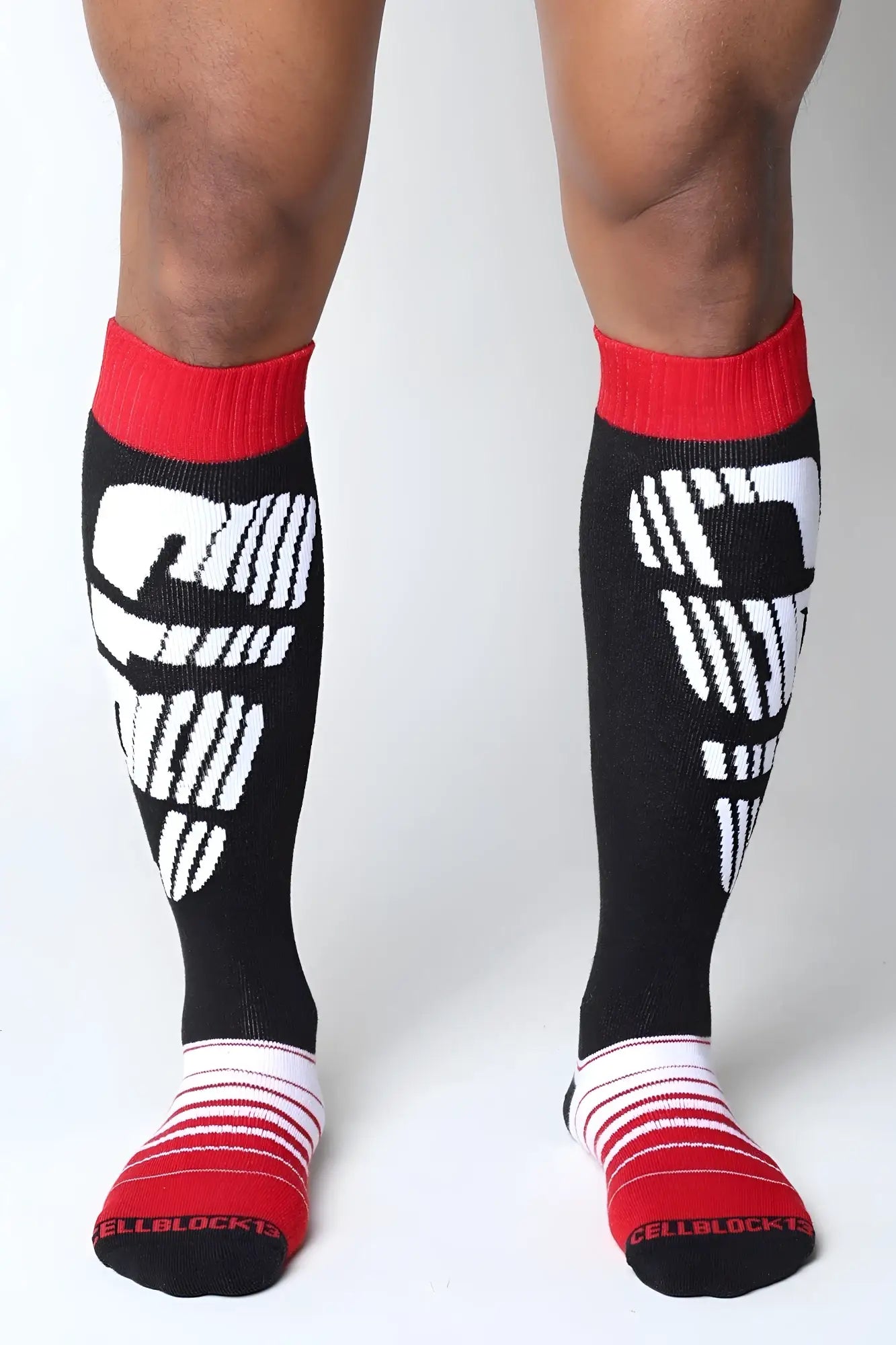 Velocity 2.0 black knee high socks with white cellblock 13 logo and red ribbed cuffs and toe sections
