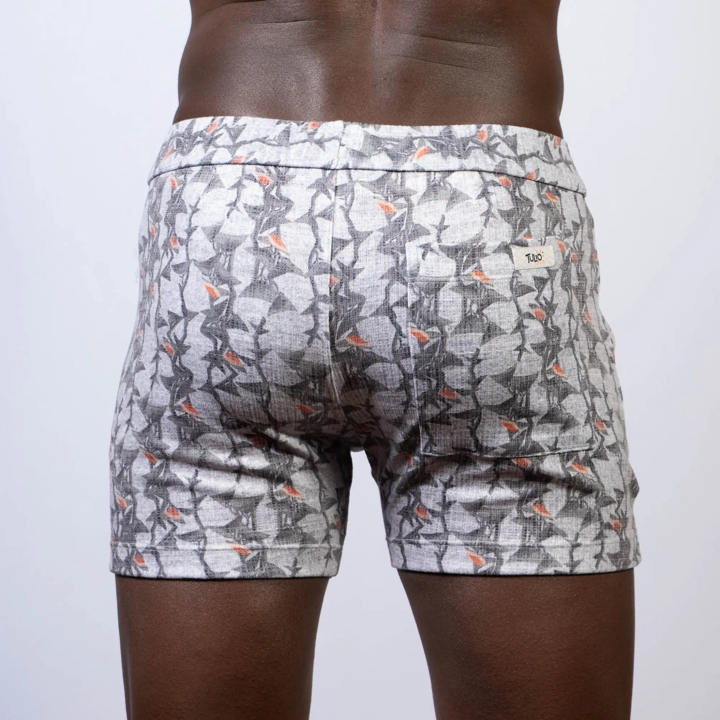 Vintage stripes linen texture shorts in gray and white pattern with subtle orange accent and elastic waistband