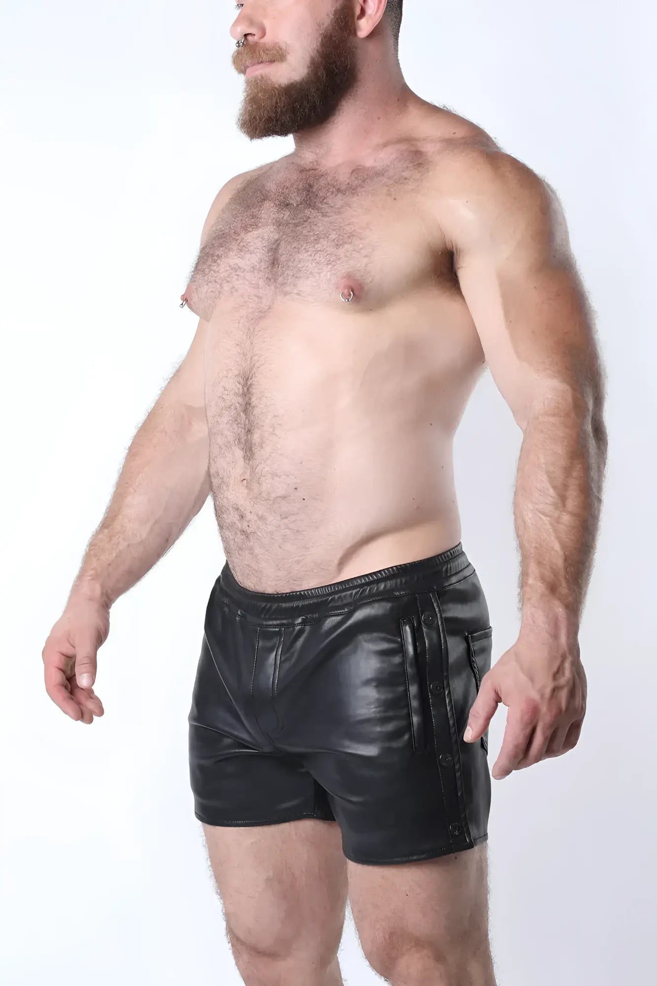 Black leather void snap up short with sleek glossy finish and side pockets with vertical zipper details