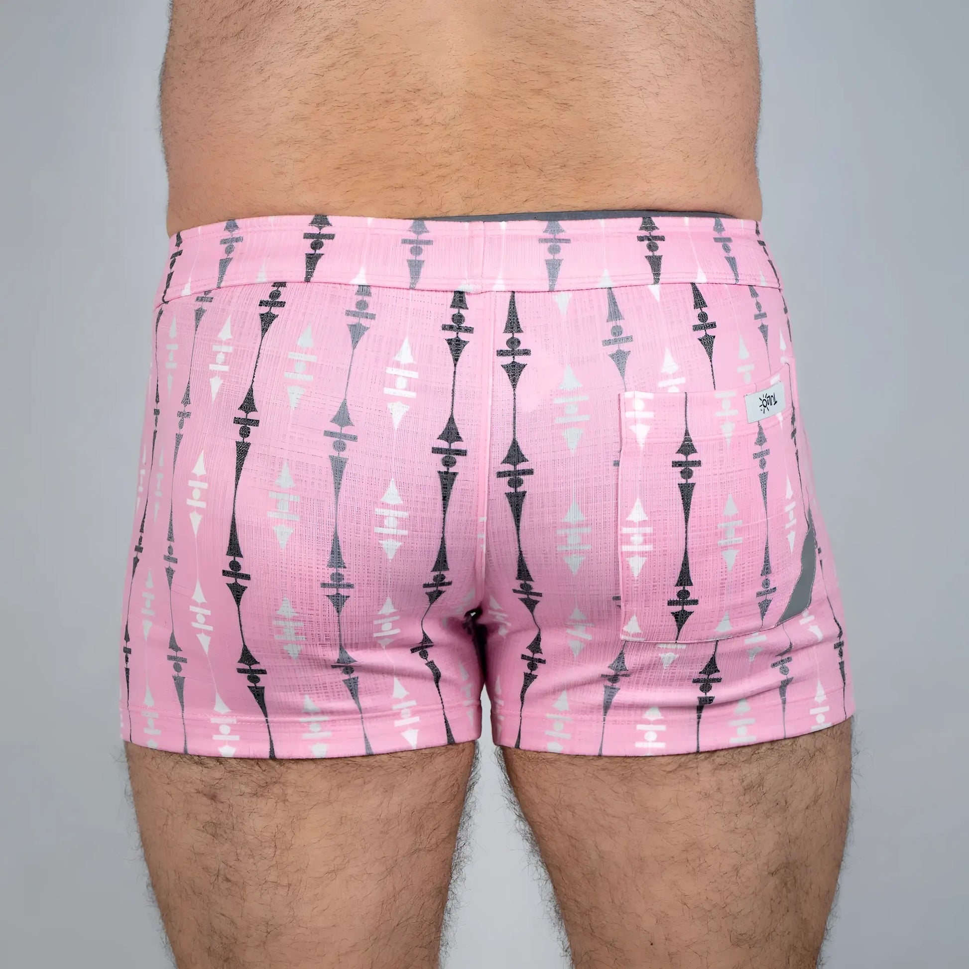 Pink wallpaper print linen texture shorts with black and white geometric pattern side pocket and small brand tag