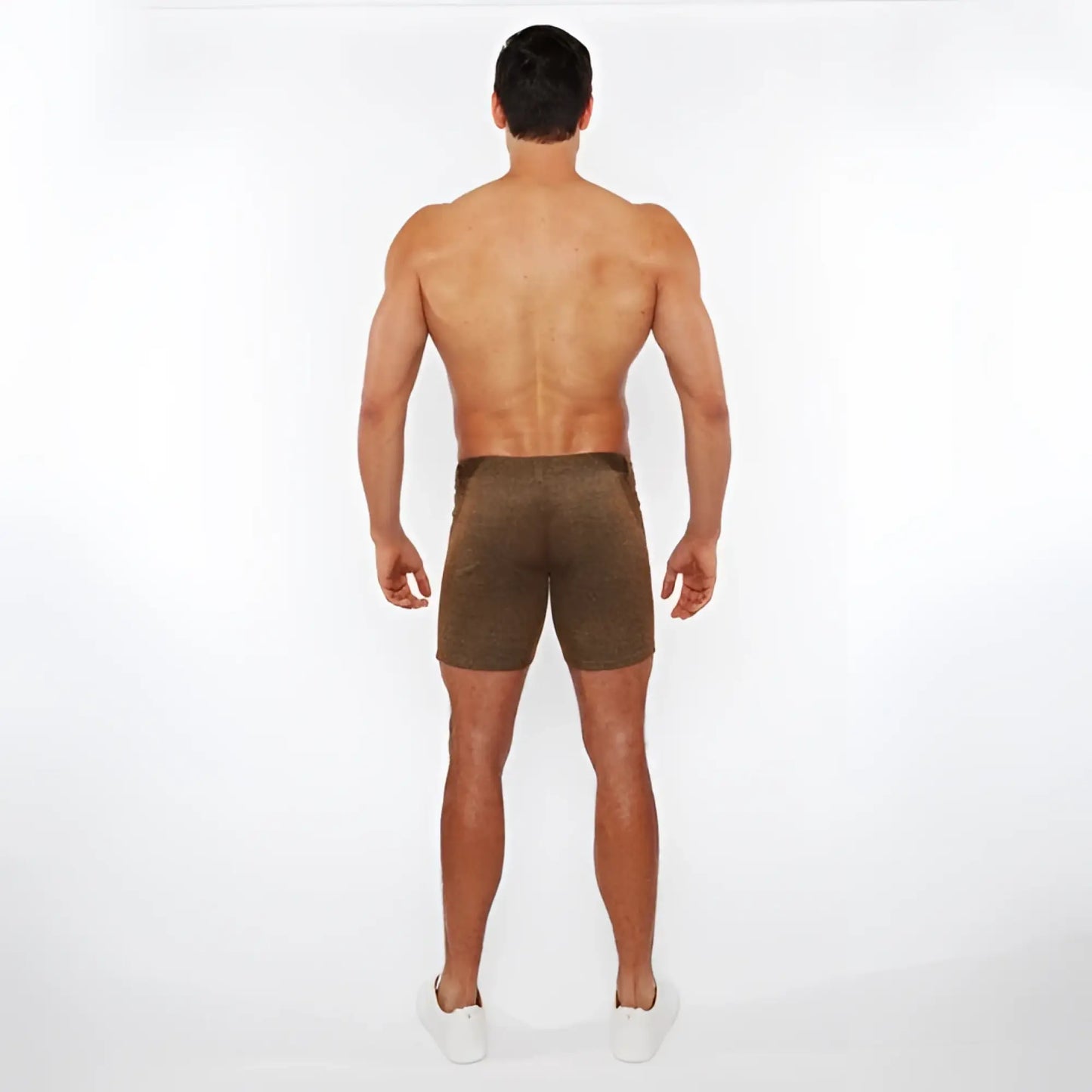 Brown washed denim stretch knit shorts with a subtle textured pattern and a form-fitting design