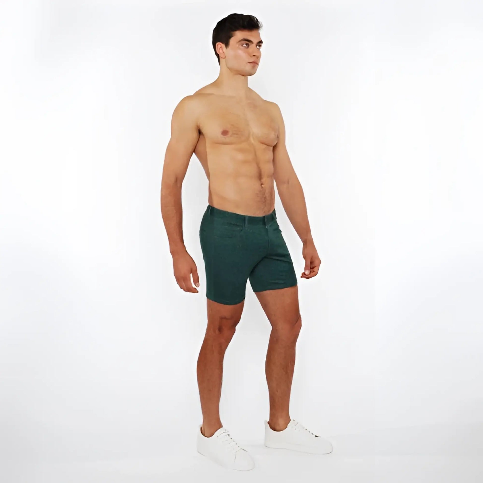Dark green washed denim stretch knit shorts with classic five-pocket design and belt loop detailing