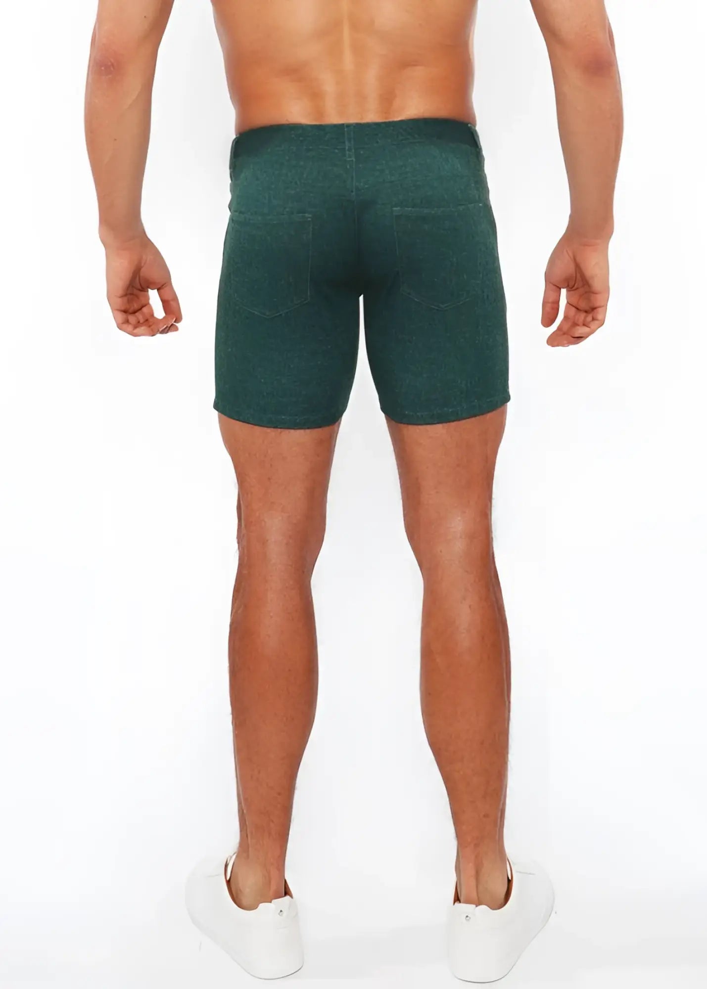 Dark green washed denim stretch knit shorts back side with subtle textured pattern and two back pockets