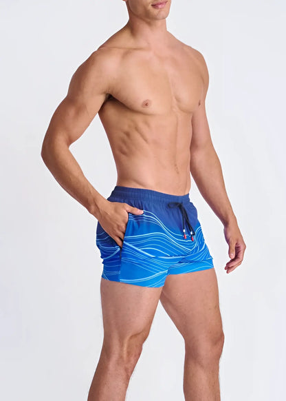 Blue waves print swim shorts with white wavy patterns black drawstring waistband and mesh lining for swimming