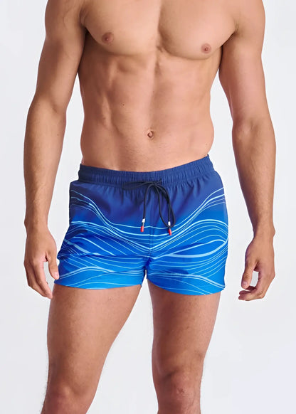 Blue waves print swim shorts with white wavy patterns black drawstring ties and mesh lining for swimming