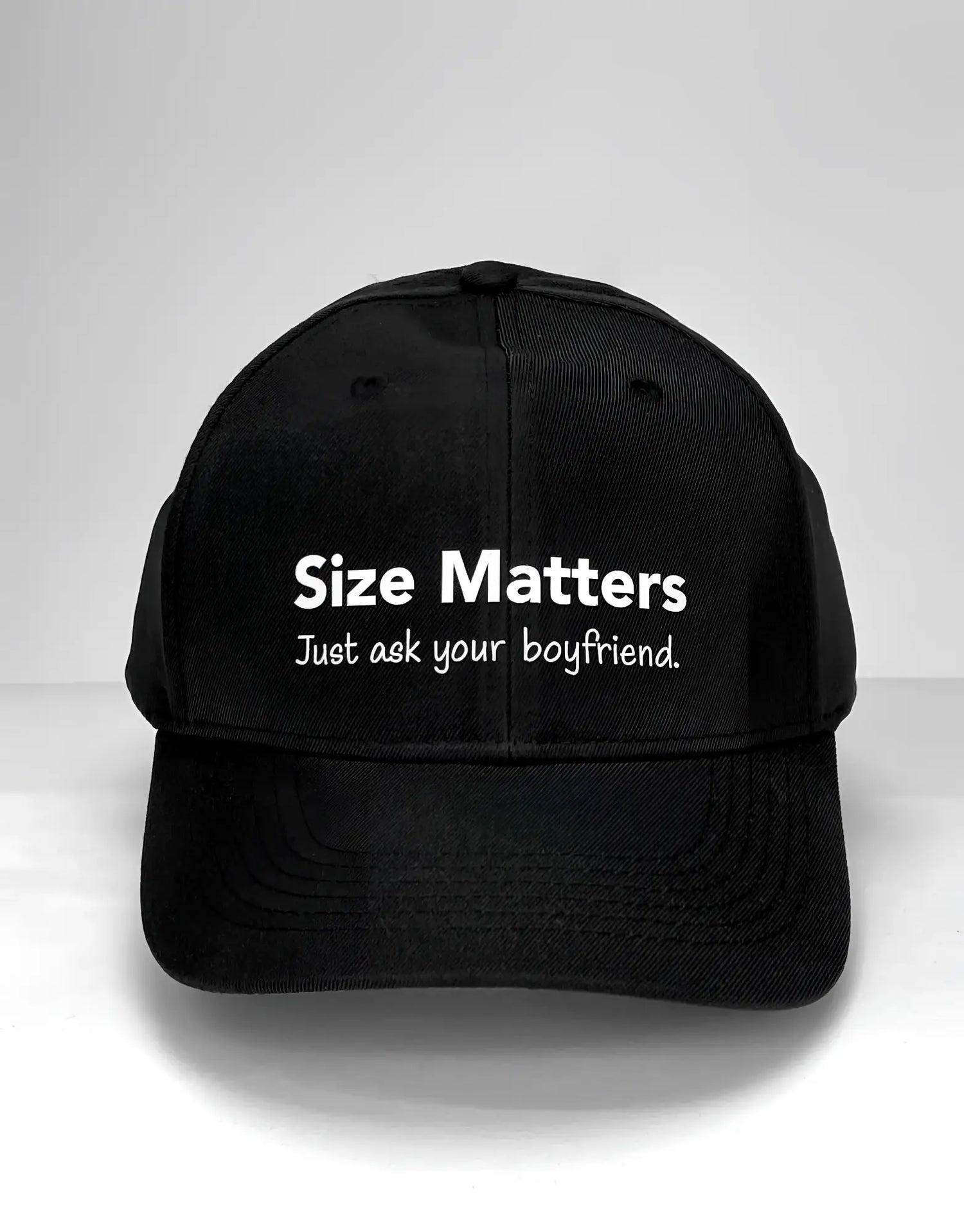 Black WildmanT baseball cap with white embroidered size matters just ask your boyfriend text on the front