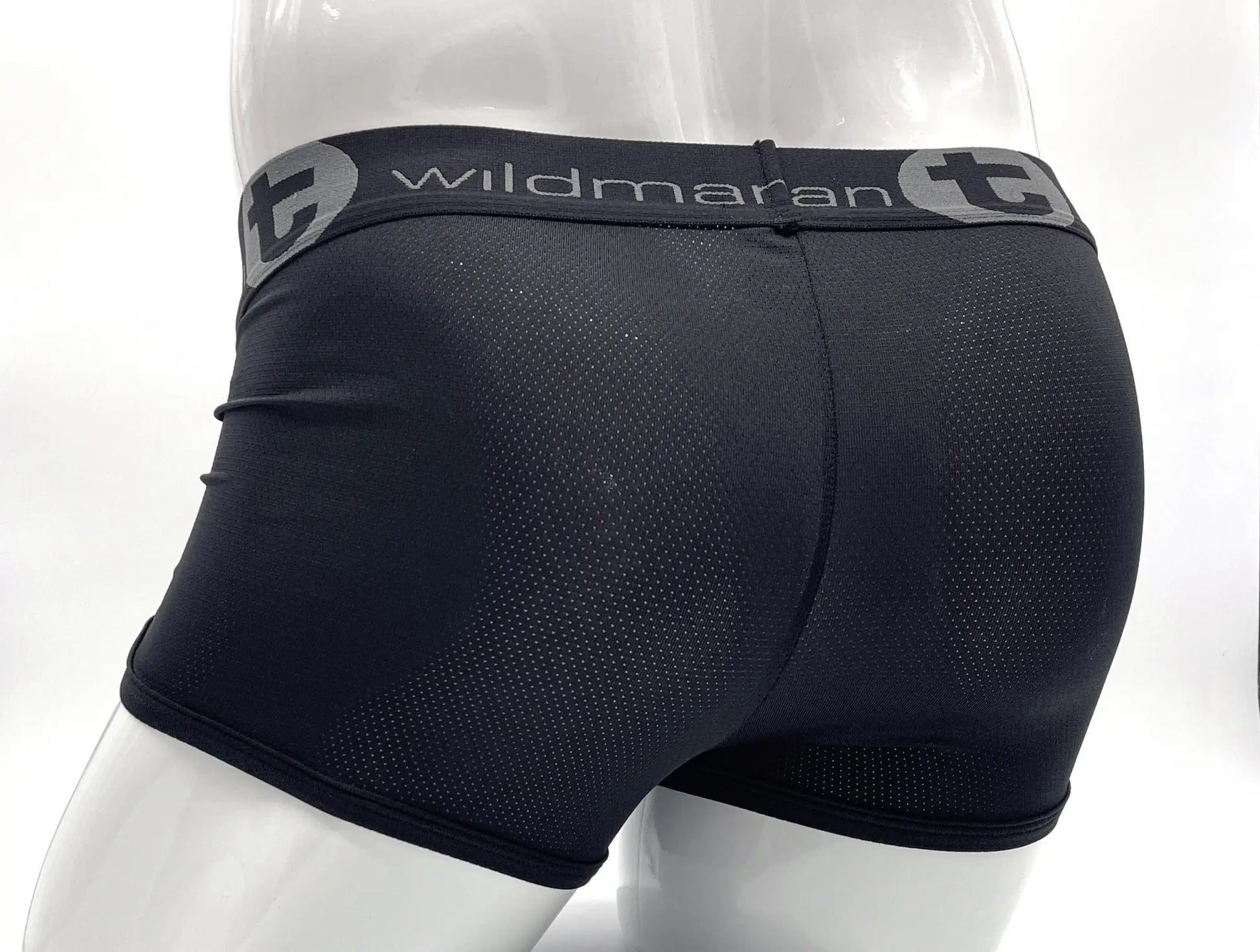 Black wildmanT big boy mesh pouch boxer briefs with gray elastic waistband featuring the brand logo