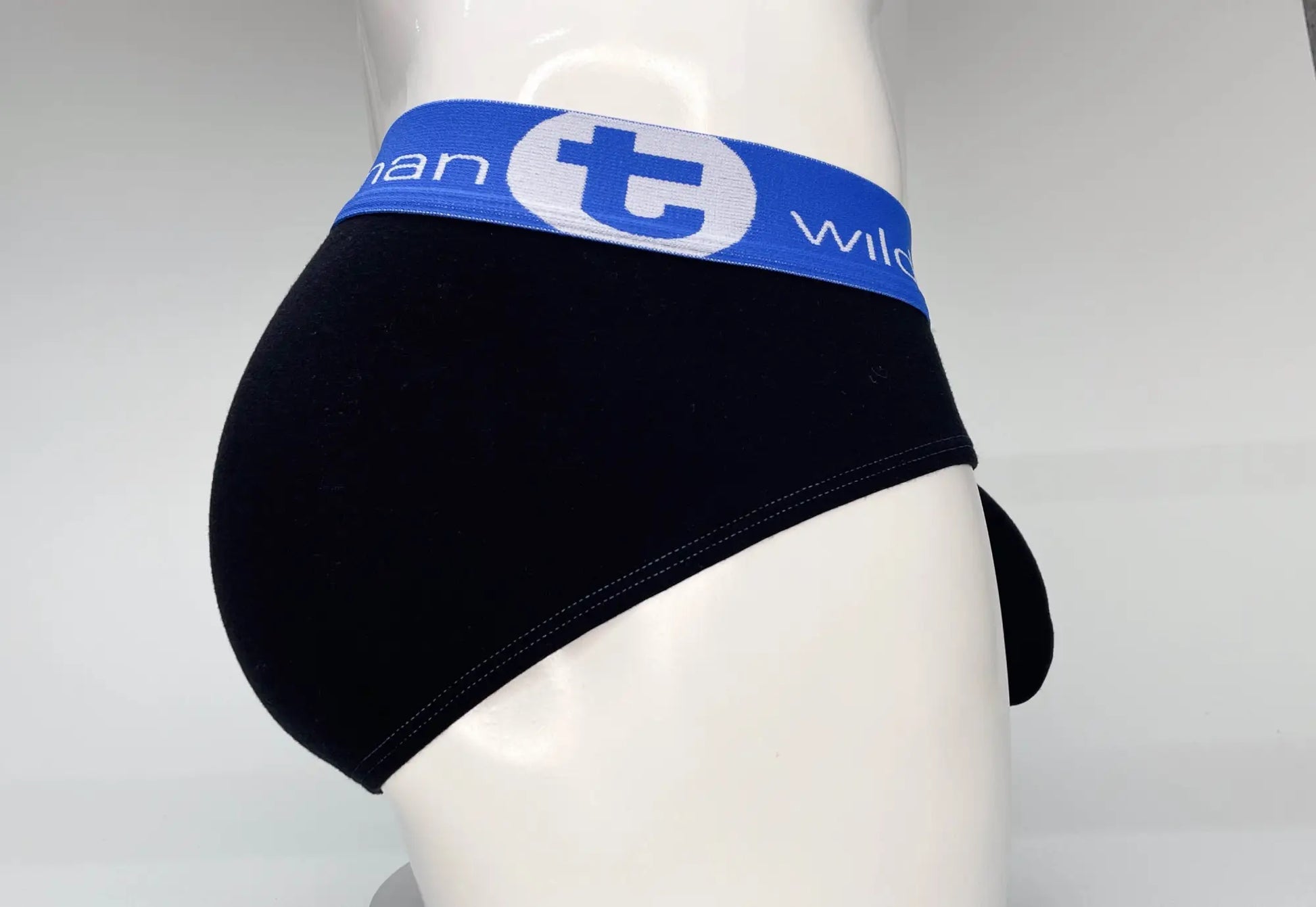 Black cotton wildmant big boy pouch brief with blue elastic waistband featuring t wild logo