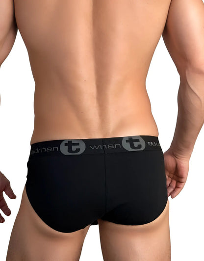 Black cotton briefs with gray elastic waistband featuring wildman logo and stylized t emblem from wildmant big boy pouch collection