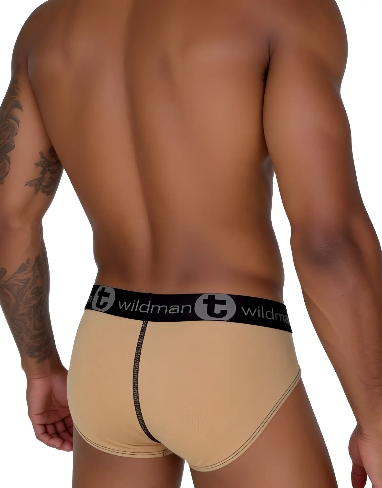 Tan cotton briefs with a black waistband featuring the "wildman" logo and a vertical black center seam.