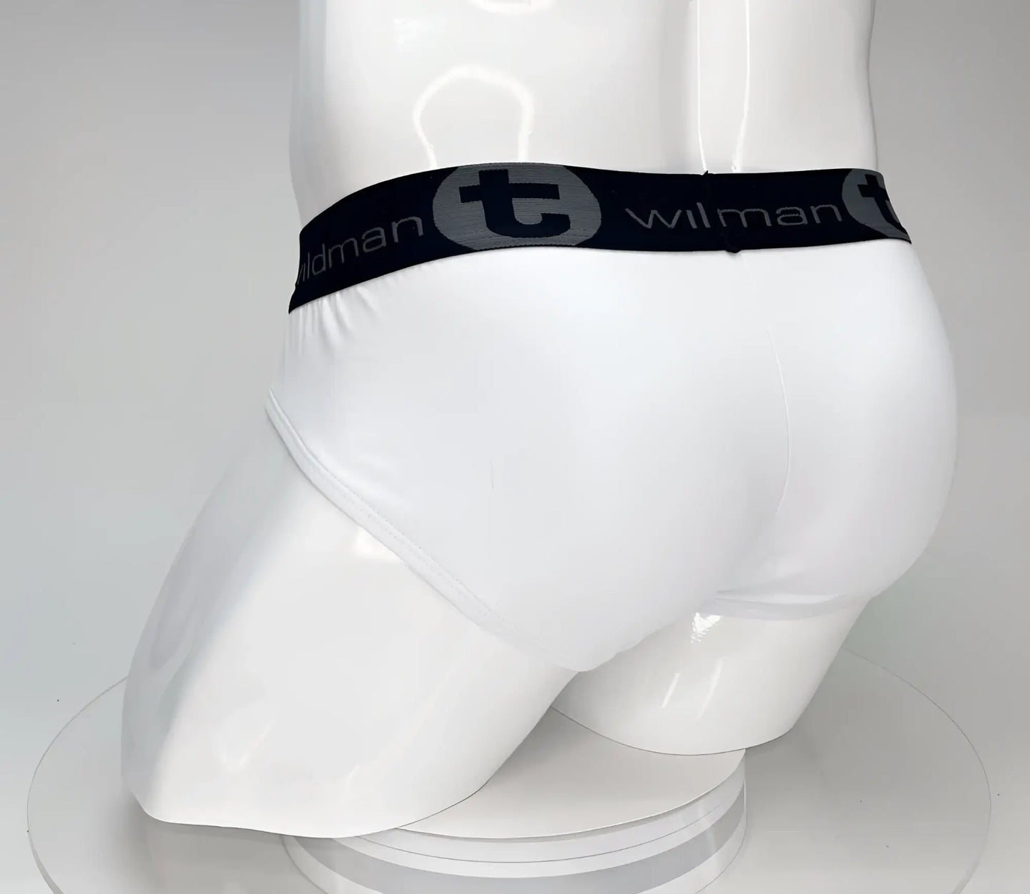 White WildmanT big boy pouch cotton briefs with a black elastic waistband featuring the brand logo in gray