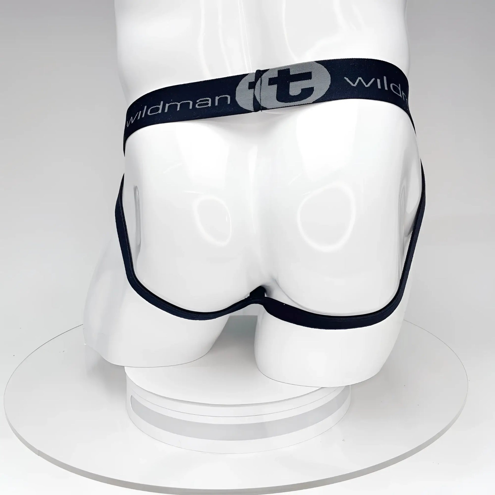 Black elastic waistband briefs with wildman fit silver branding on the pouch front from wildmant big boy pouch jockstrap black