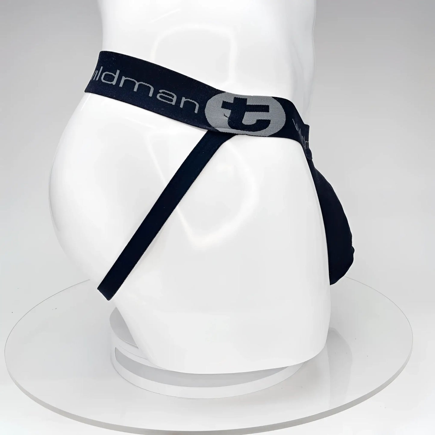 Black wildman t big boy pouch jockstrap briefs with navy waistband featuring tildman logo and stylized t emblem