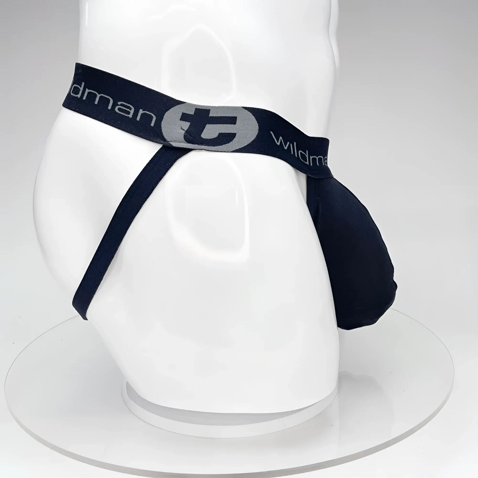 Navy blue WildmanT Big Boy Pouch jockstrap with gray logo and elastic waistband by Wildman brand