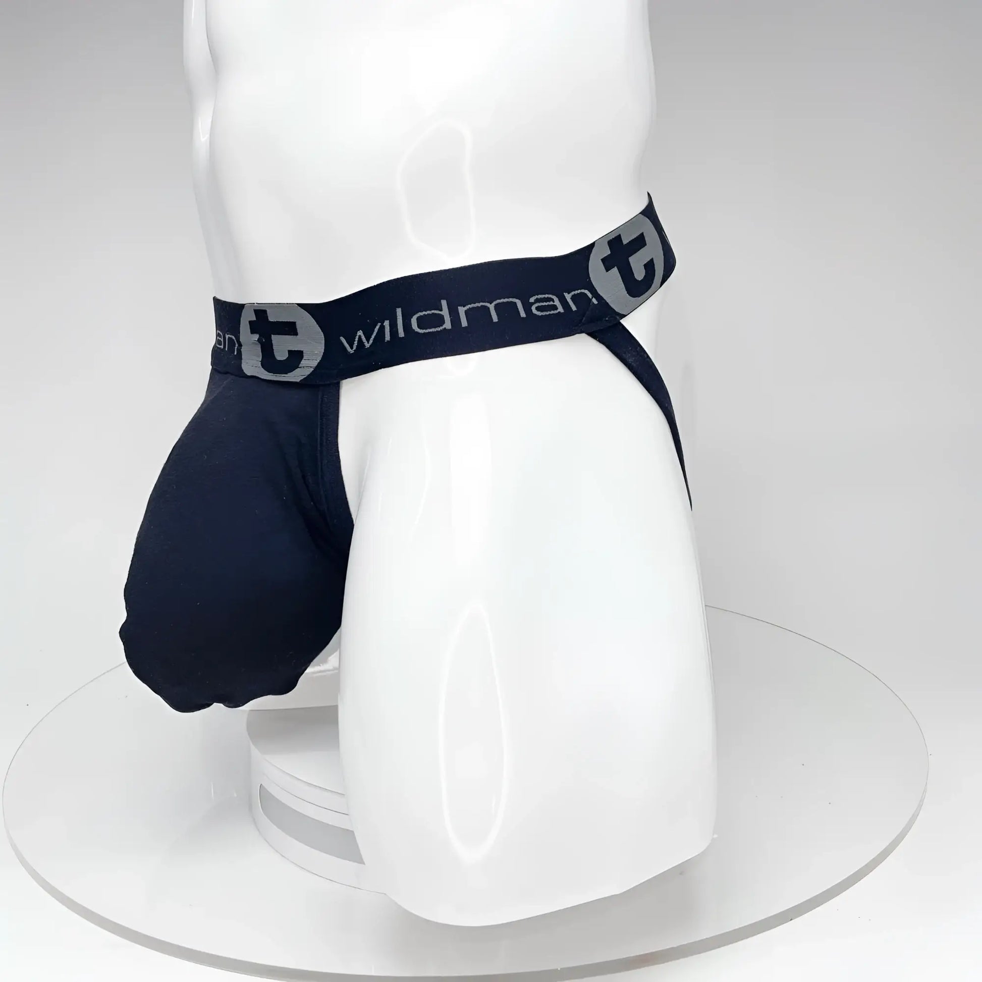 Navy blue WildmanT Big Boy Pouch jockstrap with elastic waistband and logo detailing front view