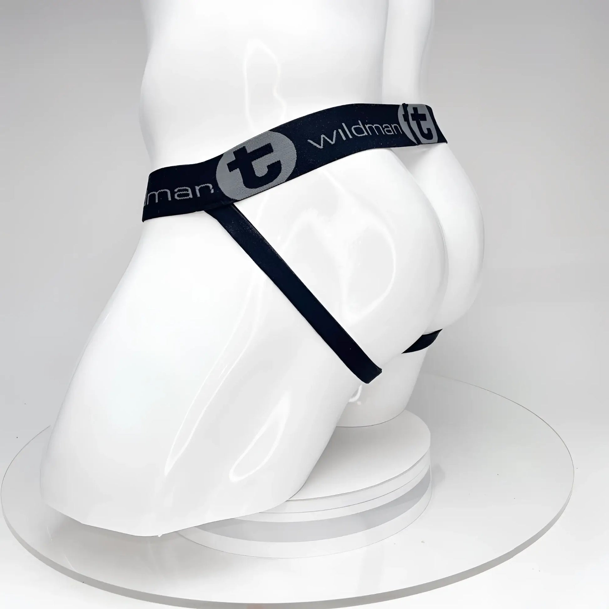 WildmanT big boy pouch black thong with gray logo and elastic waistband designed for comfort and support