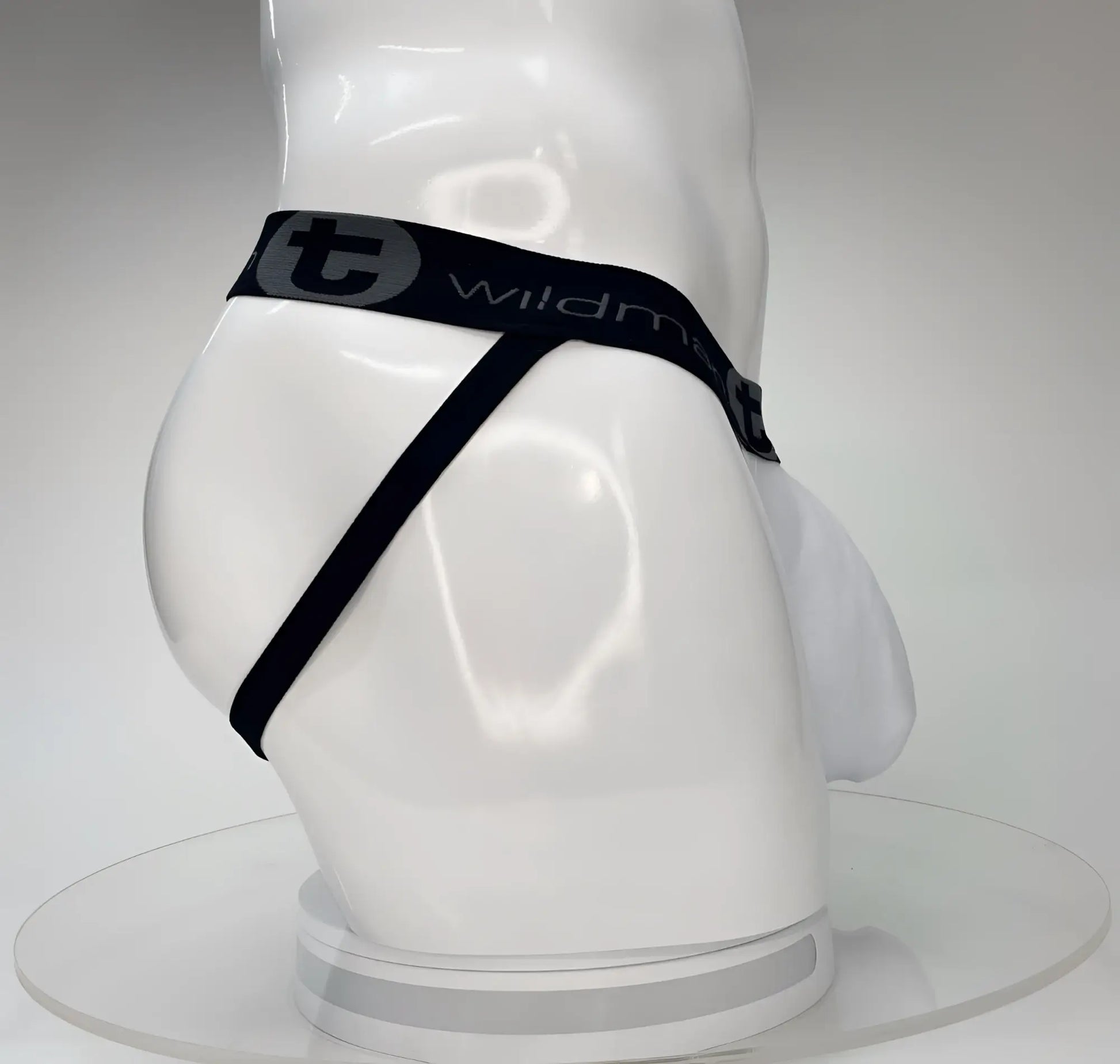 Wildmant big boy pouch jockstrap white with black and white athletic briefs and branded wildman waistband