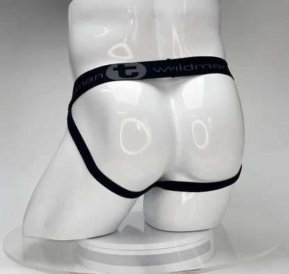 Black elastic waistband briefs with wildman branding on white mannequin for wildmant big boy pouch jockstrap white product