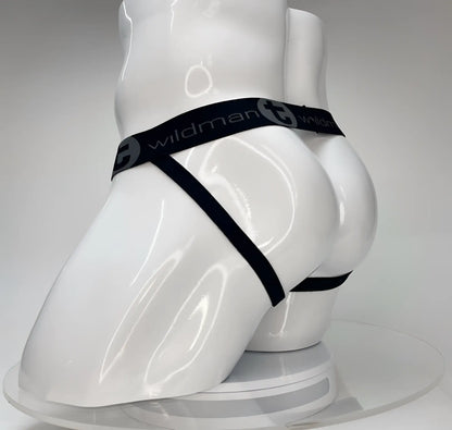 Black elastic waistband with wildman branding on white mannequin showing wildmant big boy pouch jockstrap white