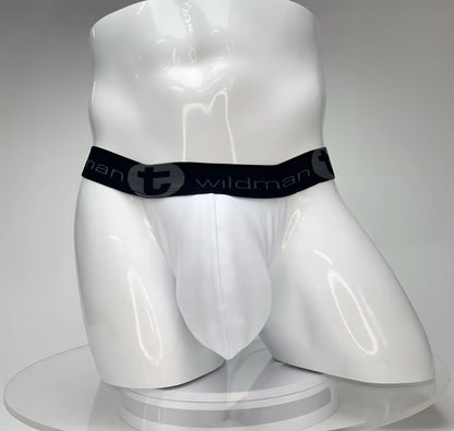 White WildmanT jockstrap with a contoured big-boy pouch and a black branded elastic waistband on a white mannequin.