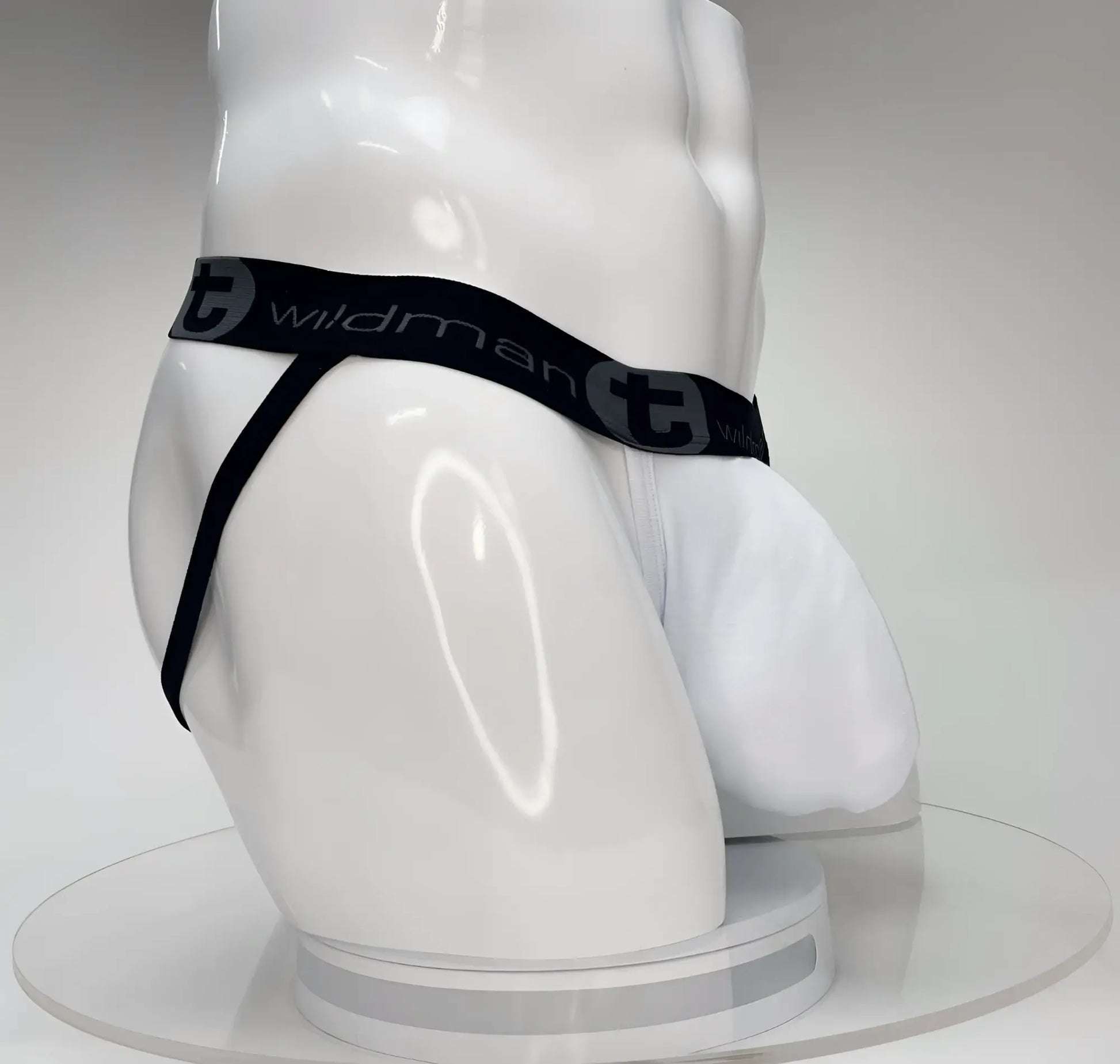 Wildmant big boy pouch jockstrap white briefs with black elastic waistband and wildman logo for support and comfort