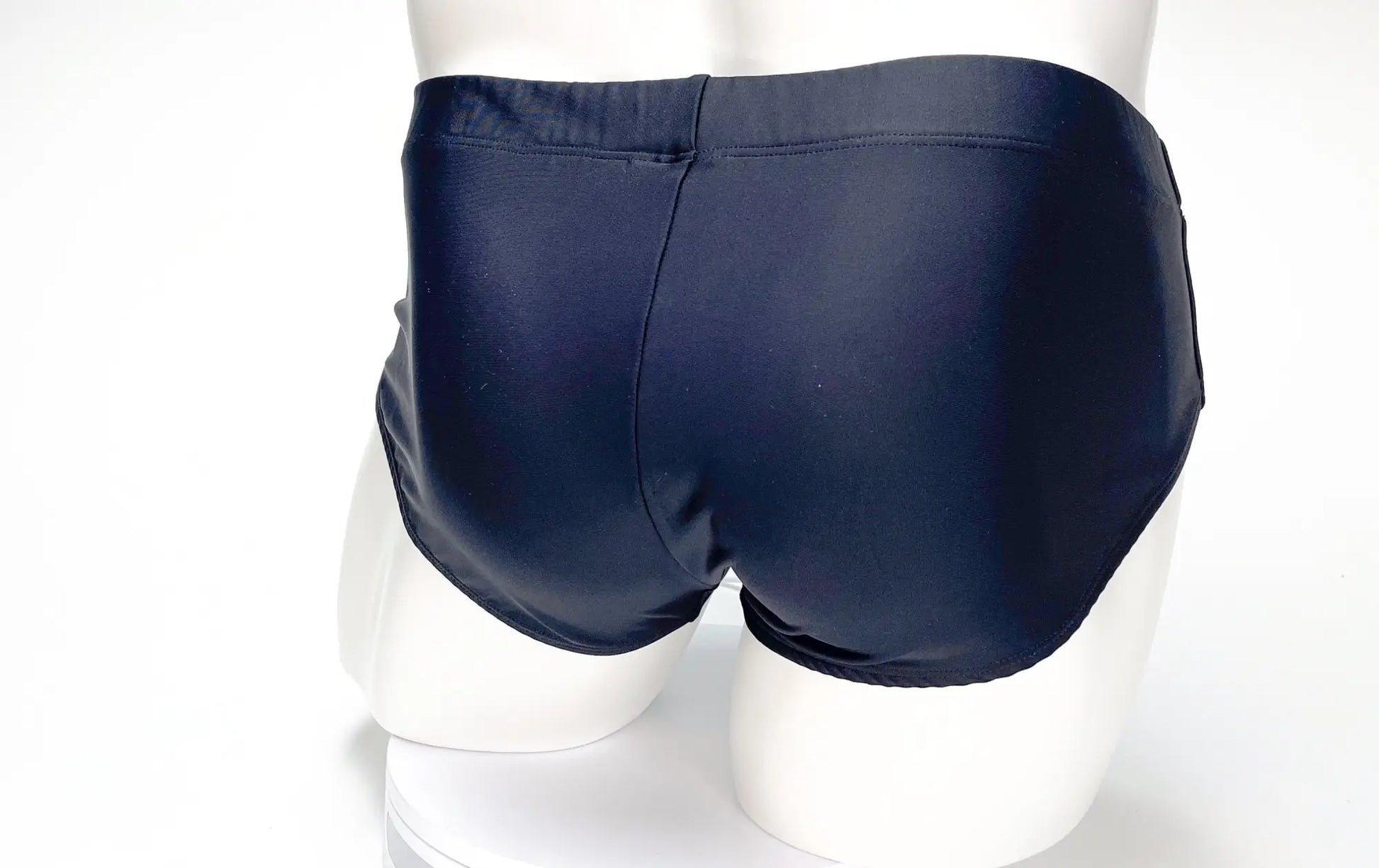 Wildmant big boy pouch swim brief black in dark navy blue with a smooth glossy finish for swimming and beachwear