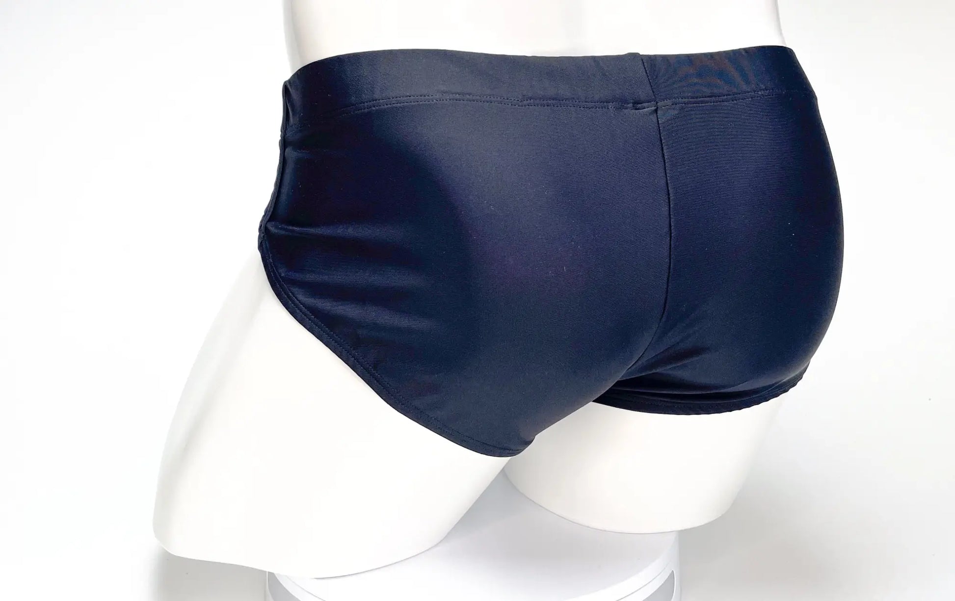 Wildmant big boy pouch swim brief black in dark navy blue with a smooth glossy finish for swimming use