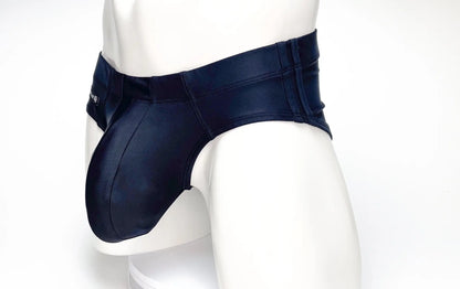 Navy blue wildmant big boy pouch swim brief in faux leather with a sleek form-fitting design and visible stitching details