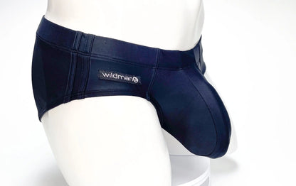 Navy blue WildmanT Big Boy Pouch swim briefs with stretch fabric and a branded patch on the waistband