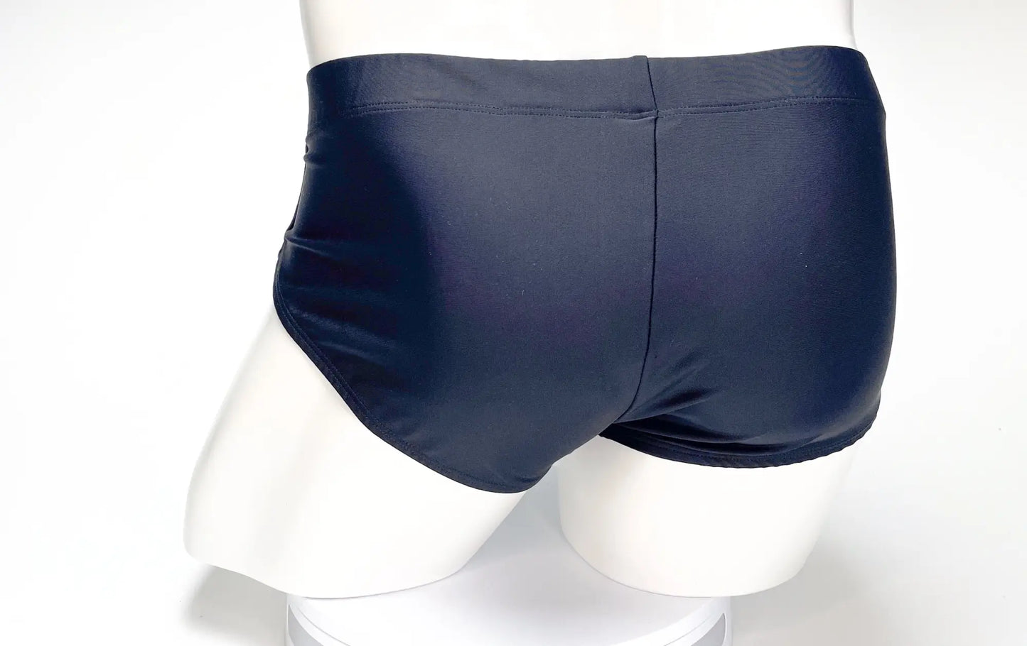 WildmanT big boy pouch swim brief black with a smooth glossy finish and a classic cut in navy blue
