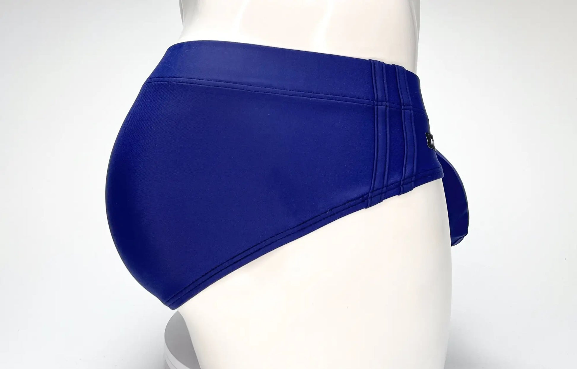 WildmanT big boy pouch swim brief navy in royal blue with a smooth glossy finish and tailored fit