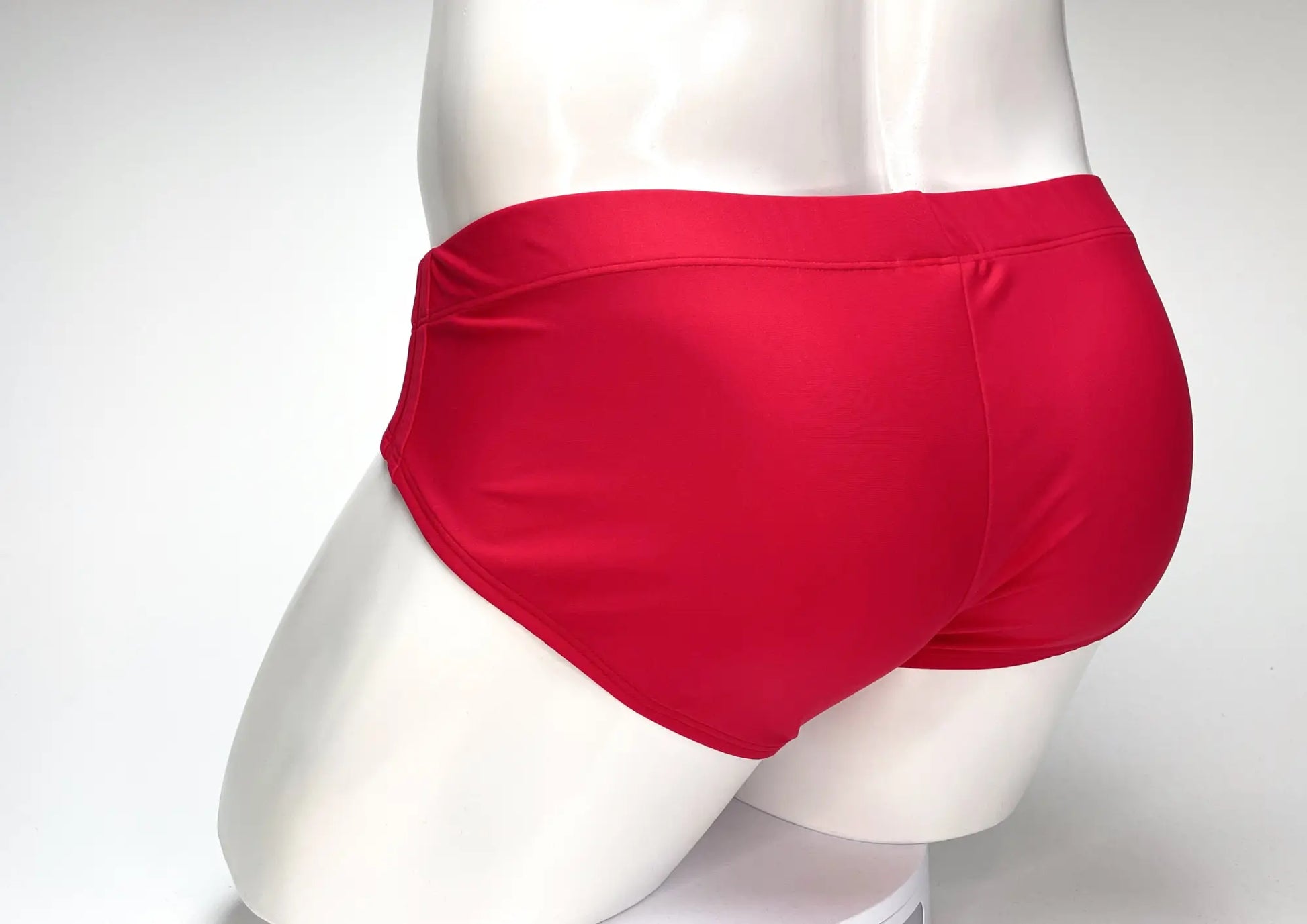 WildmanT big boy pouch swim brief in bright red with a smooth satin-like finish perfect for swimming