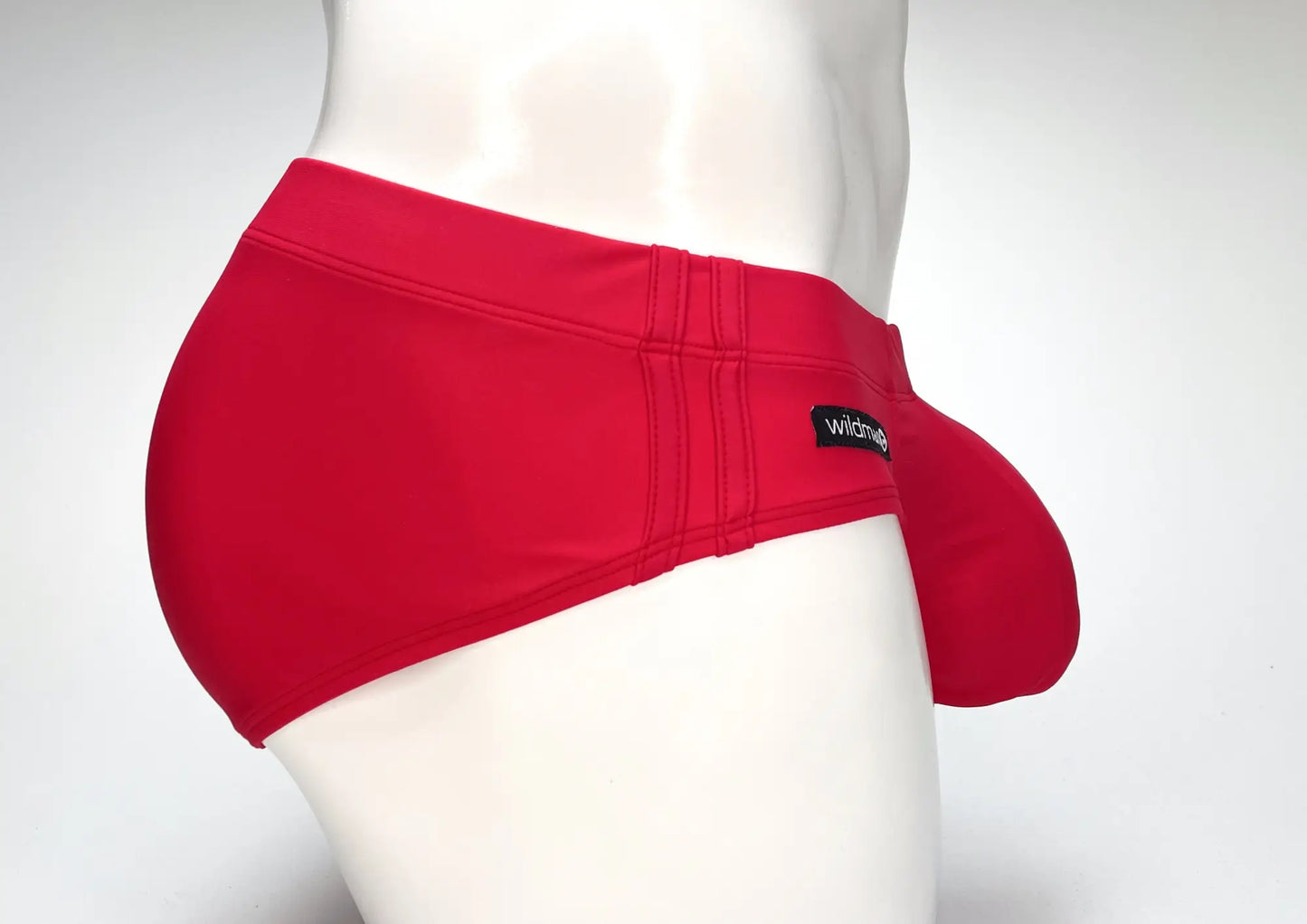 Red wildmant big boy pouch swim brief with snug fit elastic waistband and black wildme brand tag on the side