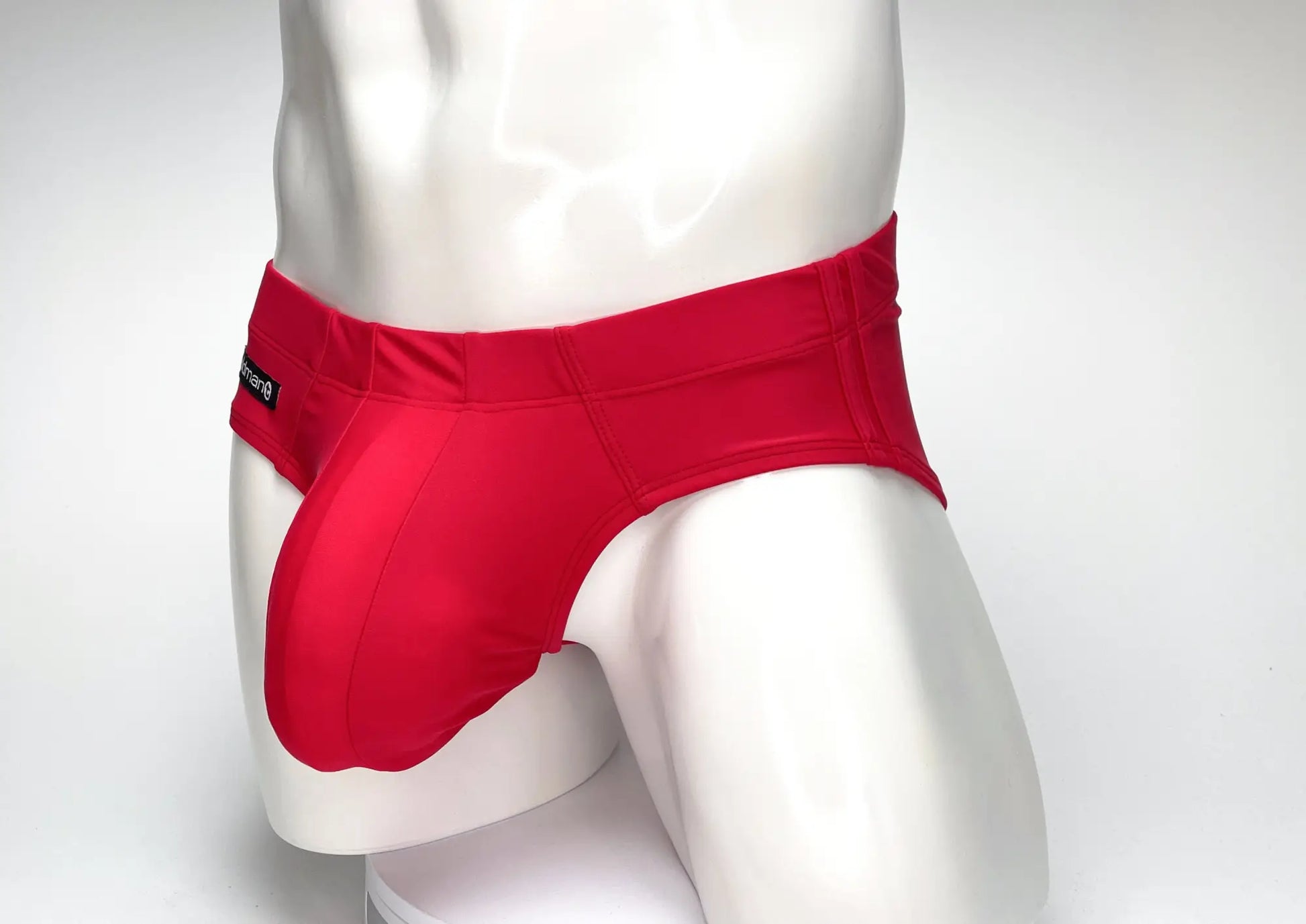 Red wildmant big boy pouch swim brief with supportive contoured design and black brand tag on waistband